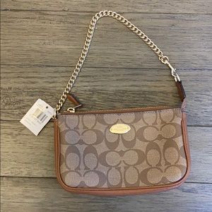 COACH WRISTLET -SIGNATURE COATED CANVAS